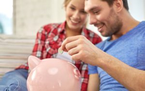 Couple-with-Piggy-Bank